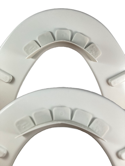 P-flector attached to round and elongated toilet seats showing product flexibility
